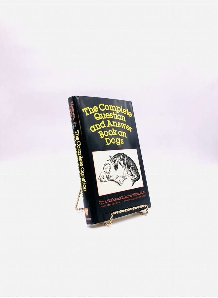 The Complete Question and Answer Book on Dogs. Inscribed by Chris Walkowicz and Bonnie Wilcox, DVM. First Edition, First Printing. Dutton. New York, 1988.
