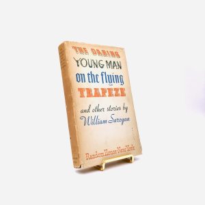 The Daring Young Man on the Flying Trapeze. Signed by William Saroyan. First Edition, First Printing. Random House. New York, 1934.